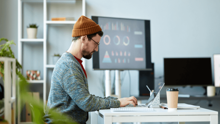  young serious it worker concentrating on network in office