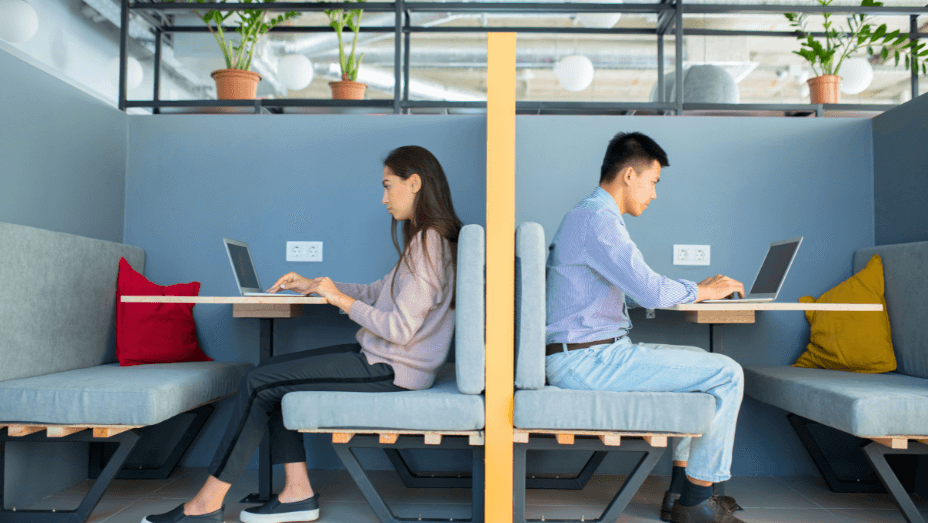 busy-young-employees-working-in-modern-co-working-space