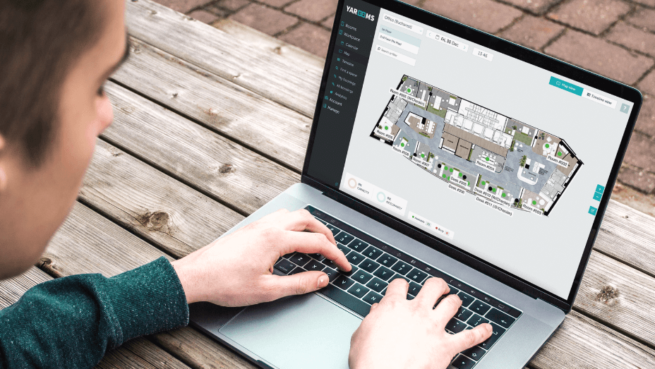 man using Yarooms Desk Booking Software