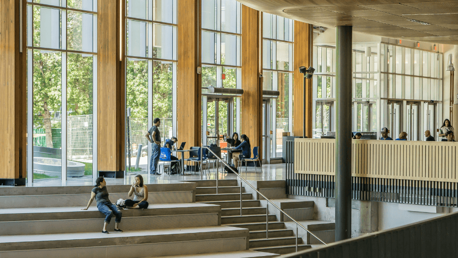 school common area with students and visitors