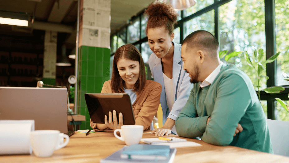 Multiracial office coworker team using digital tablet