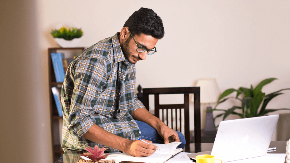 young man working from home office