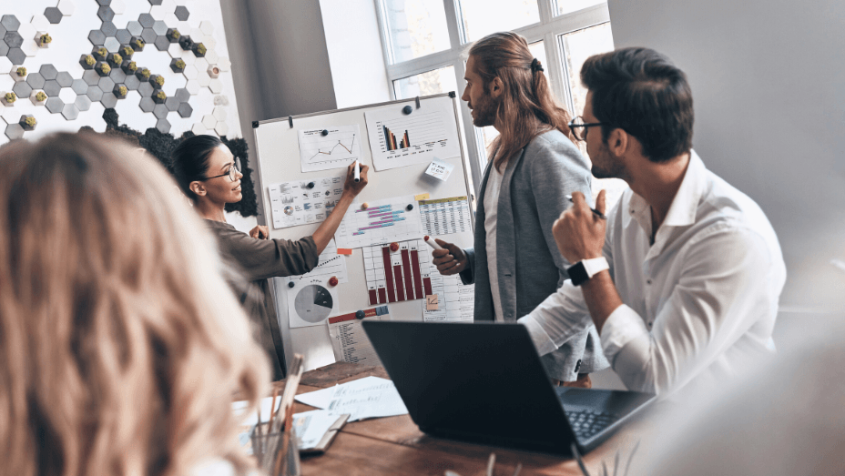 modern young man and woman conducting a business presentation while working in the office