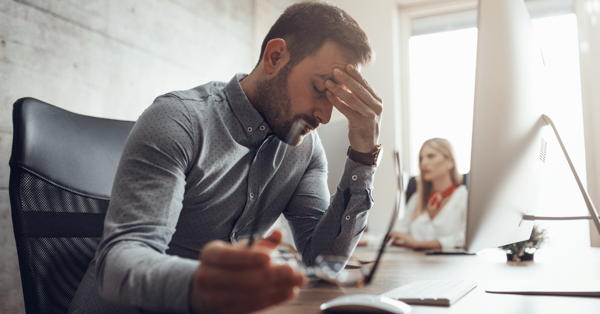 Stressed employee in a hybrid workplace