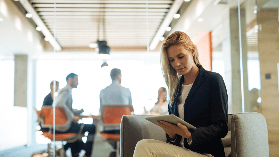 woman checking room scheduling application