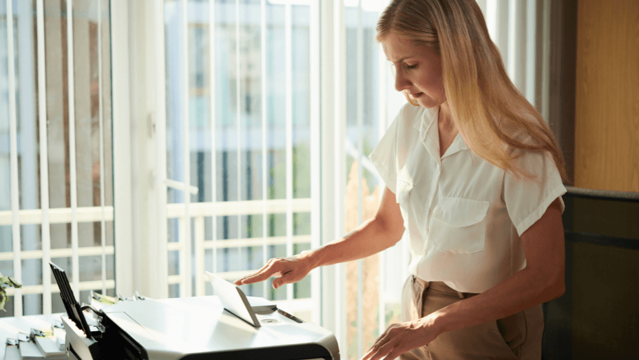 businesswoman-scanning-documents