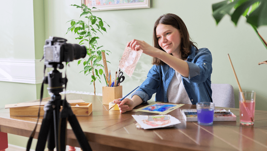 creative-girl-employee-artist-painting-in-watercolors