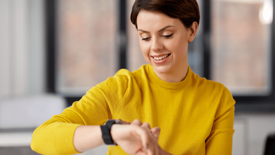 employee checking her watch