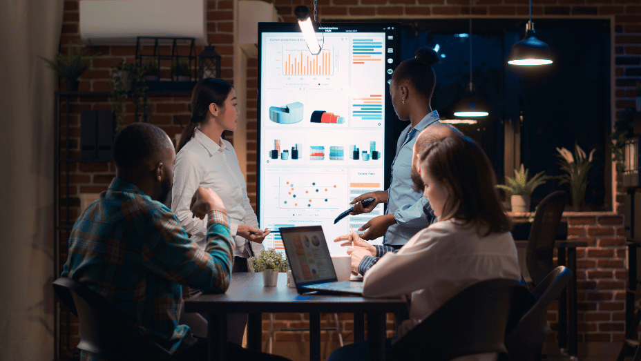 employees analyzing office analytics