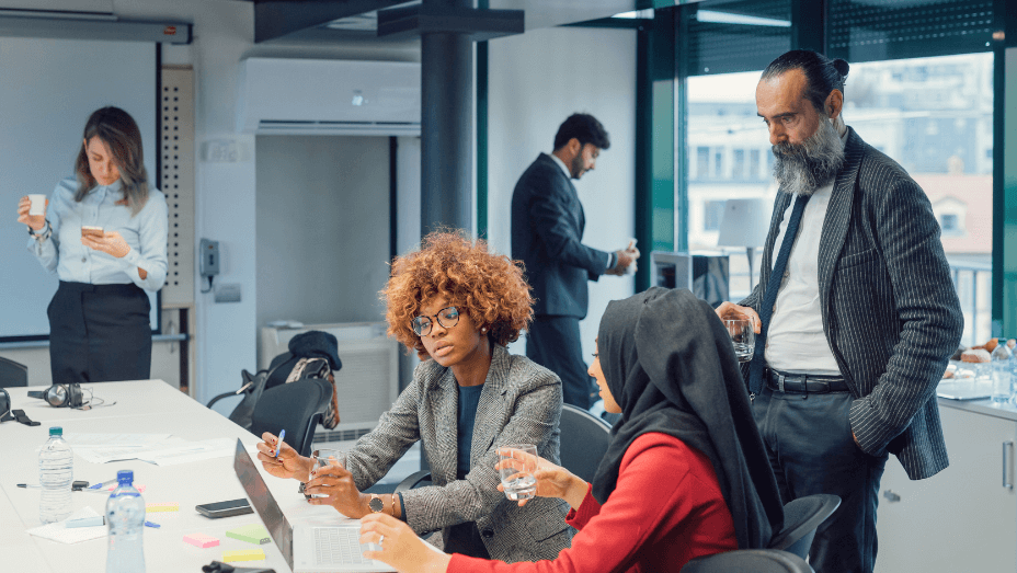 remote employees meet in the new office space