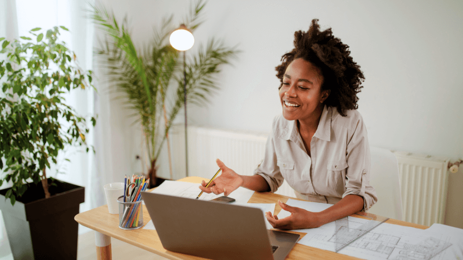 image-of-happy-black-woman-smiling-while-having-an-online-meeting