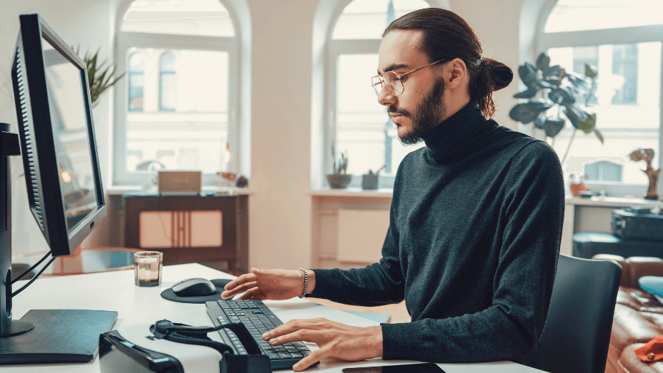 man employee using workplace technology in the office