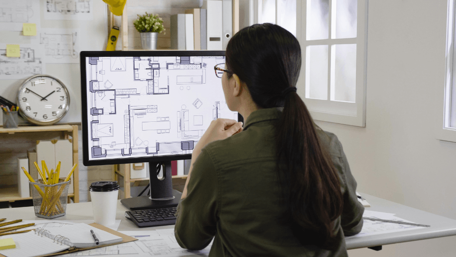 employee looking at the office floor plan