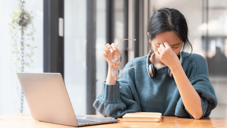 shot-of-stressed-woman-working-from-home-on-laptop