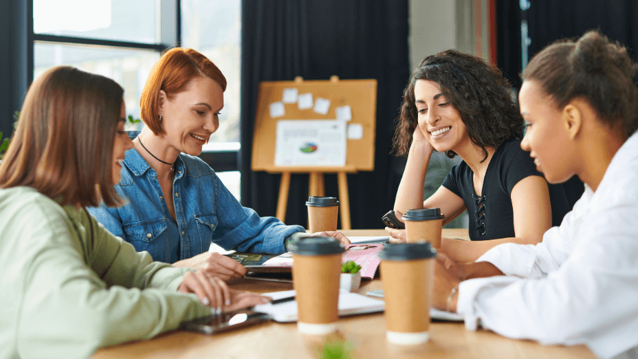 team of female employees working in a modern office