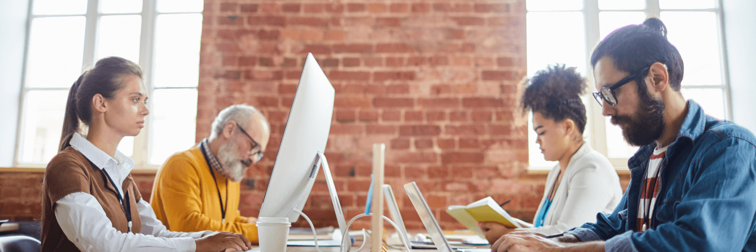 employees sharing desks