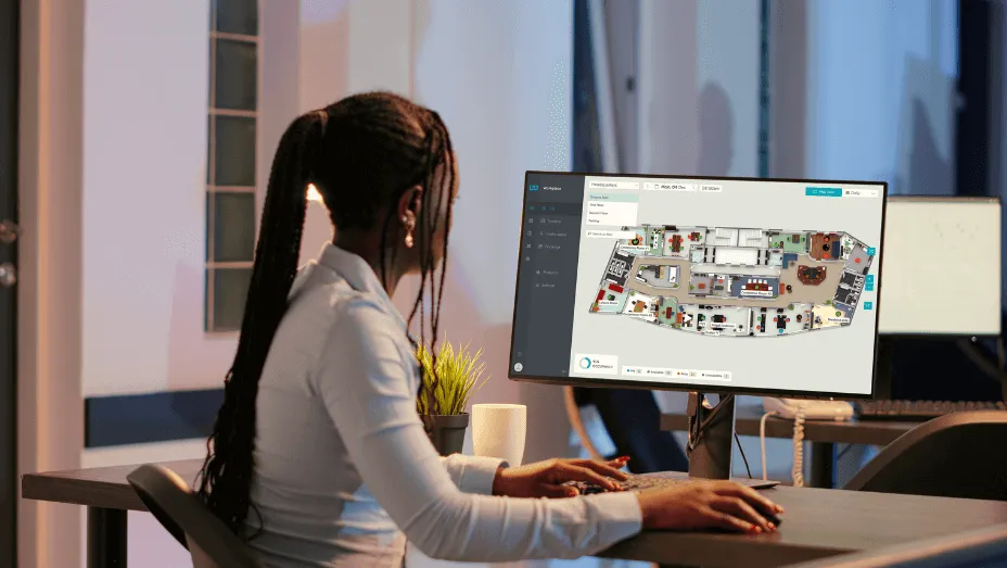 employee looking at office map