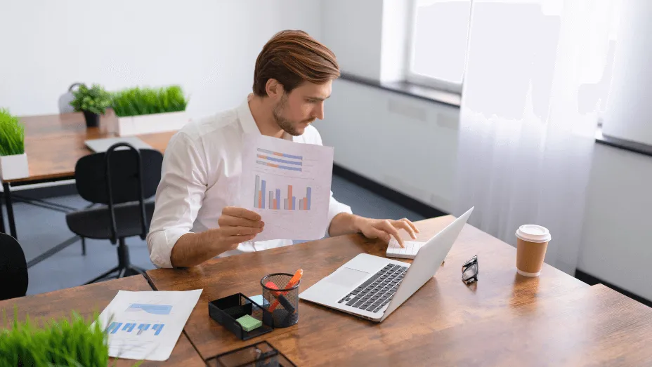 Man calculating resources and budget for digital transformation