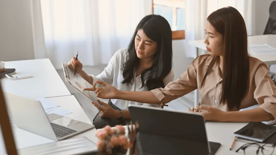 colleagues analyzing data