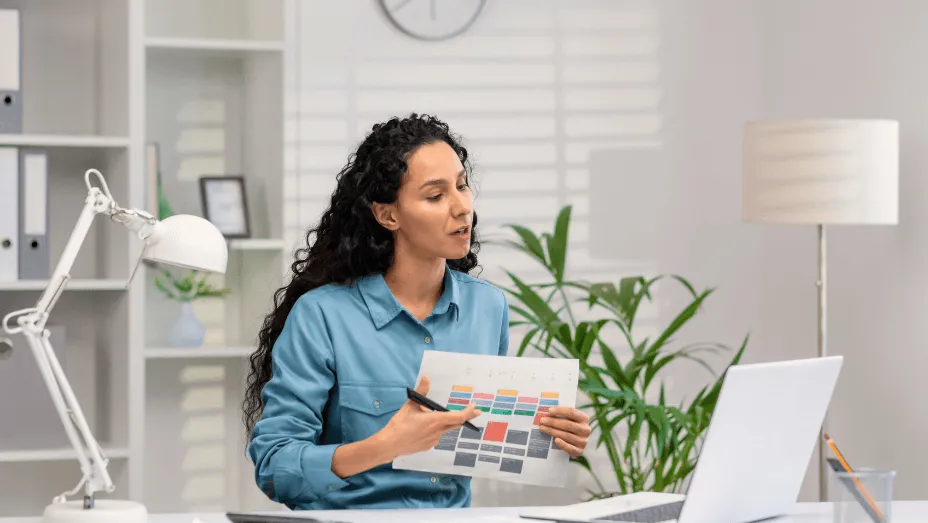 woman employee making her hybrid work planning calendar
