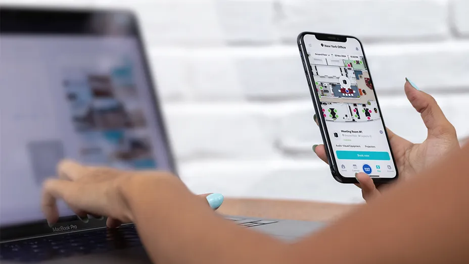 Woman using YAROOMS mobile app