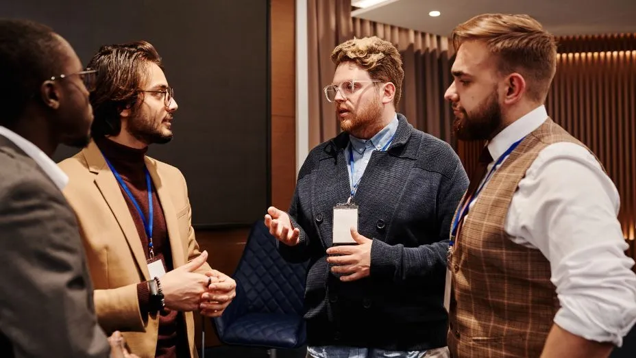 attendees discussing during event