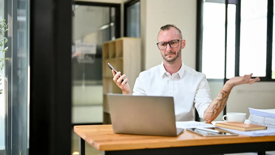 Confused employee in office