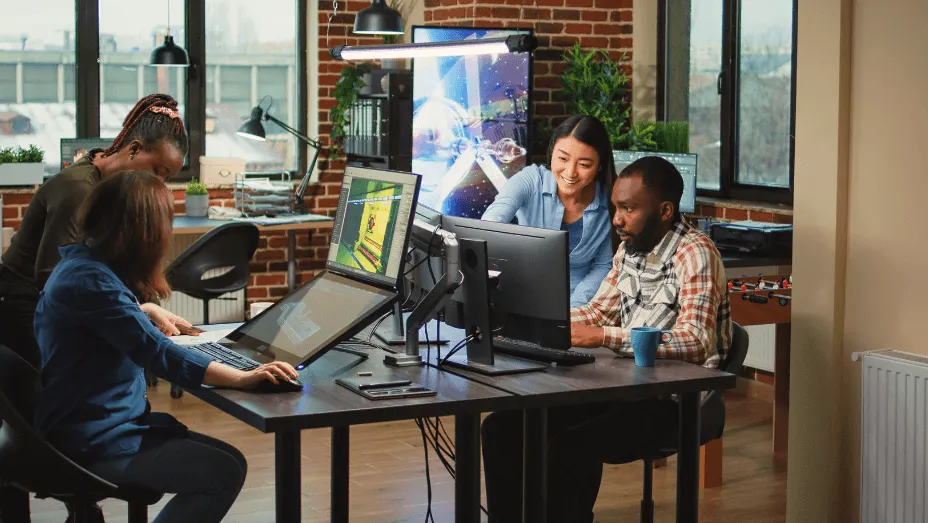 Modern technology studio employees using computers