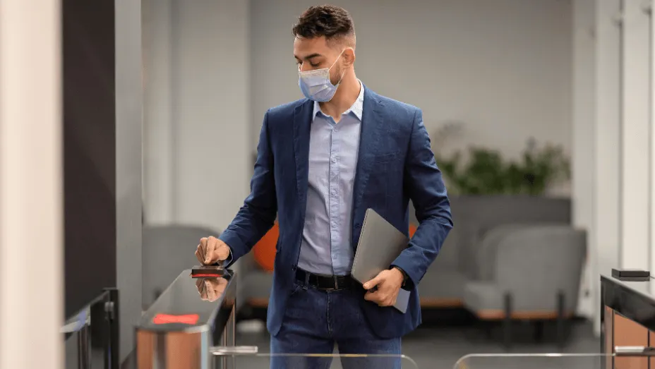 Office visitor entering with security check