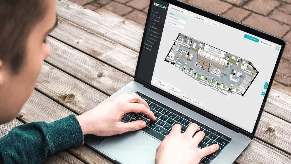 Man using YAROOMS Desk Booking Software