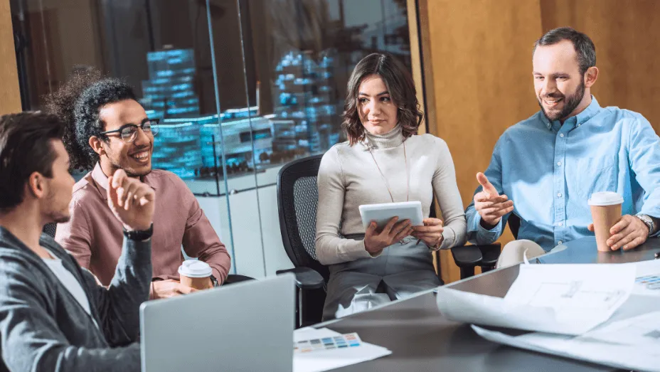 Group of young businesspeople working together in the office
