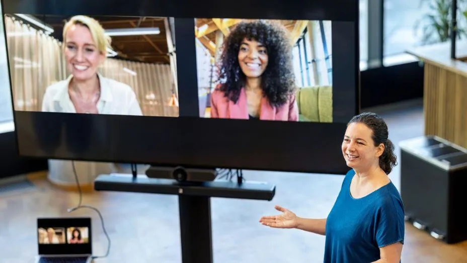 colleagues interact using video conferencing app