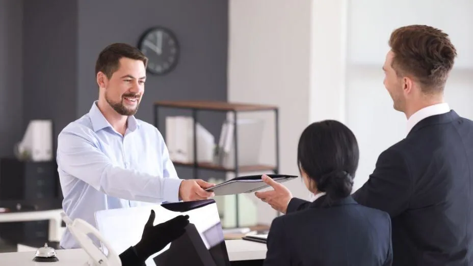 a receptionist is ready to greet visitors and make them feel welcome