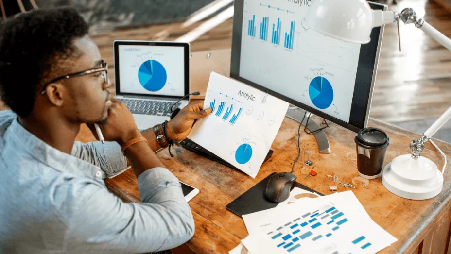 Man looking at statistics