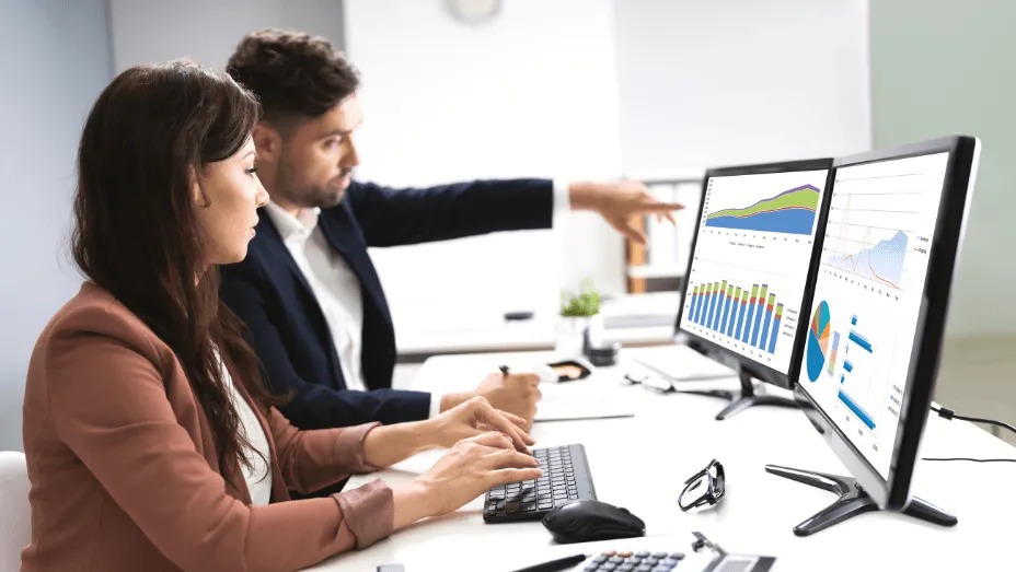 Colleagues analyzing a graph together