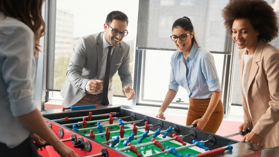 excited diverse employees enjoying funny activity