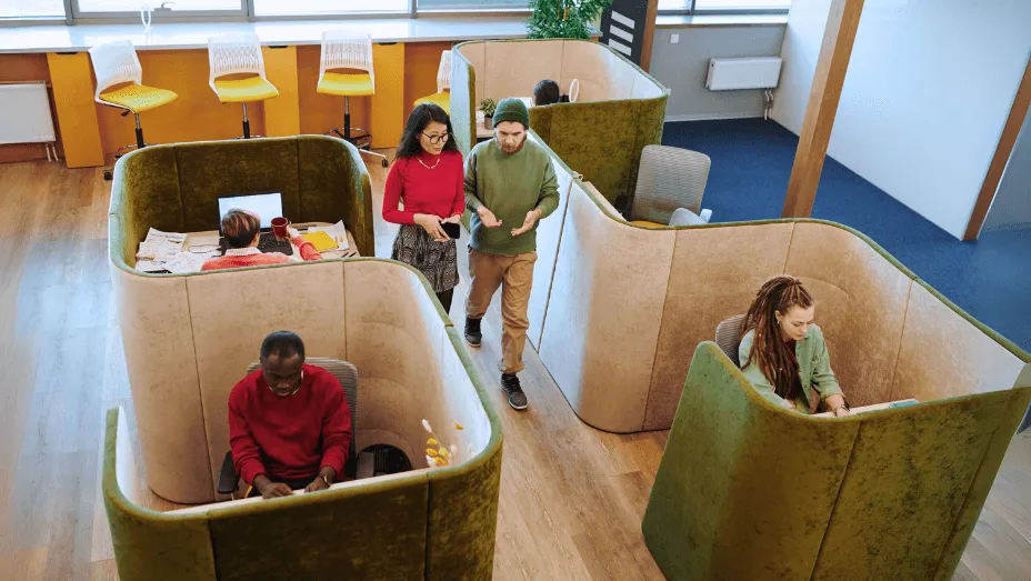 employees working in a coworking space effective work environment
