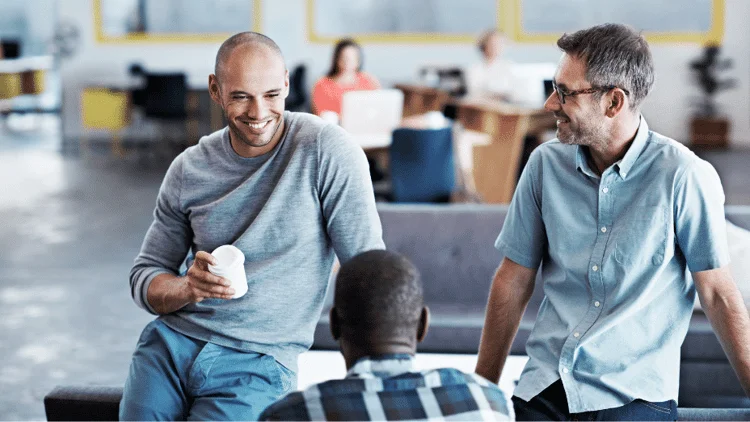 Employees working in a modern hybrid office
